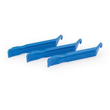 Park Tool TL-1.2 tyre lever set of 3 for easy tubeless and standard bicycle tyre removal, displayed in a workshop setting