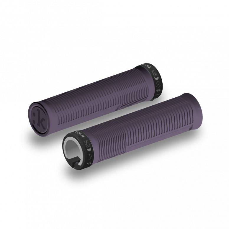 Fizik Comfort Feel MTB grip with vibration dampening and lock-on design, shown on mountain bike handlebar.
