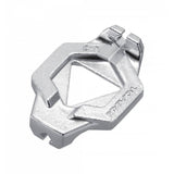 Topeak Duo Spoke Wrench tool for precise bike wheel spoke adjustments, shown in a workshop setting with the tool in focus.