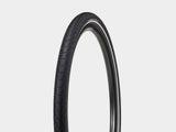 Bontrager H2 Hard-Case Ultimate tire with puncture protection and reflective sidewalls, shown mounted on a bicycle wheel.