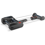 Elite Nero Smart B+ FE-C foldable indoor cycling trainer for smart resistance training, shown with adjustable rollers and digital display