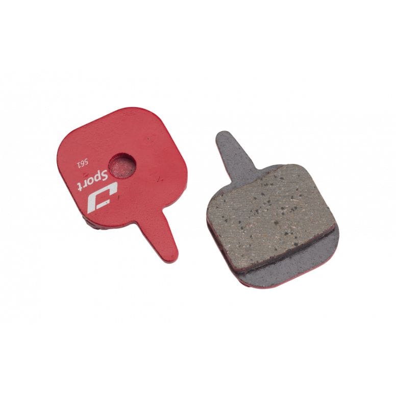 Jagwire Sport semi-metallic disc brake pads for Tektro IO mountain bike, showing the brake pad design and metal backing plate.