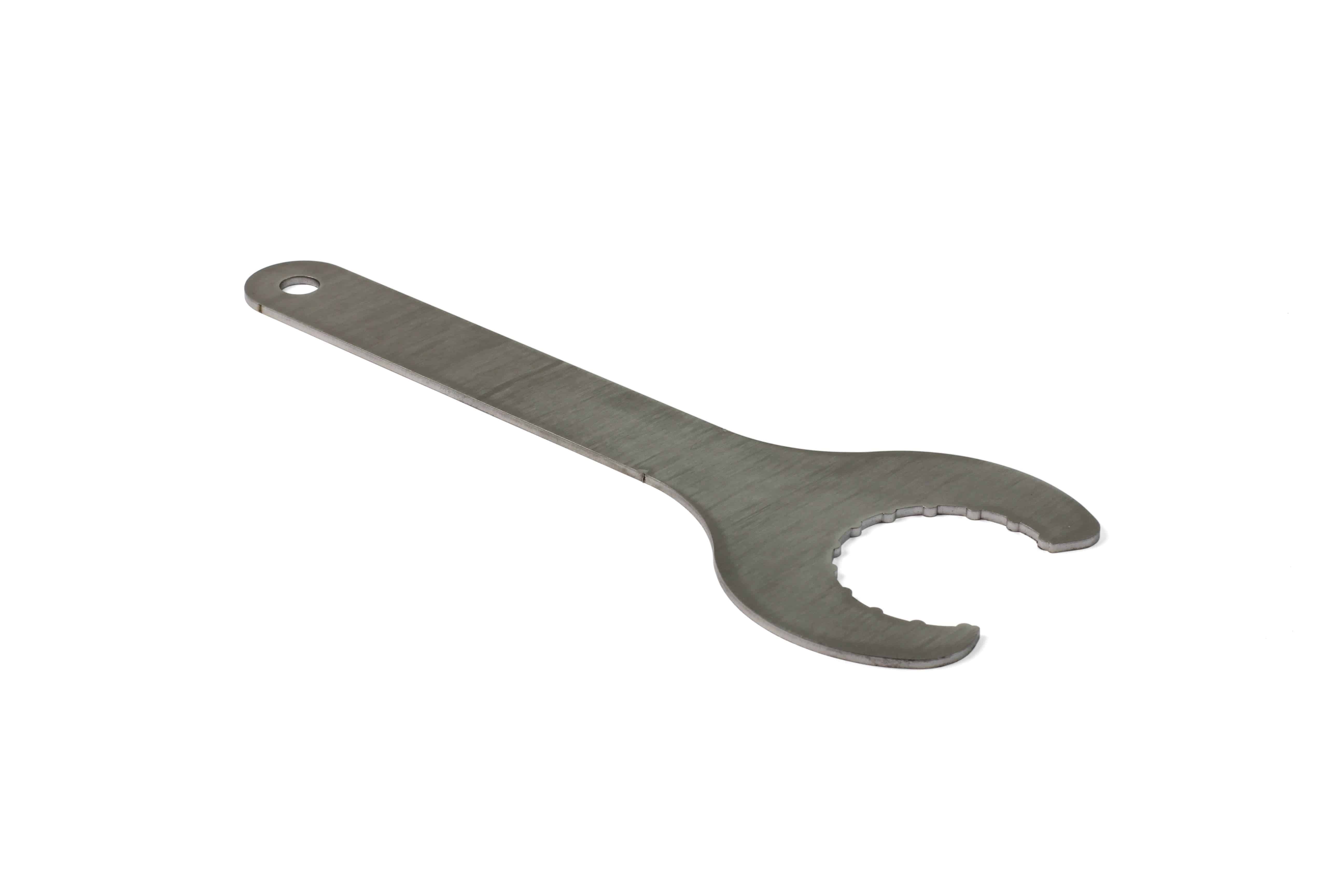 Hope Tool Bottom Bracket Install Spanner for BSA and 24mm axle bike maintenance, shown in a workshop setting.