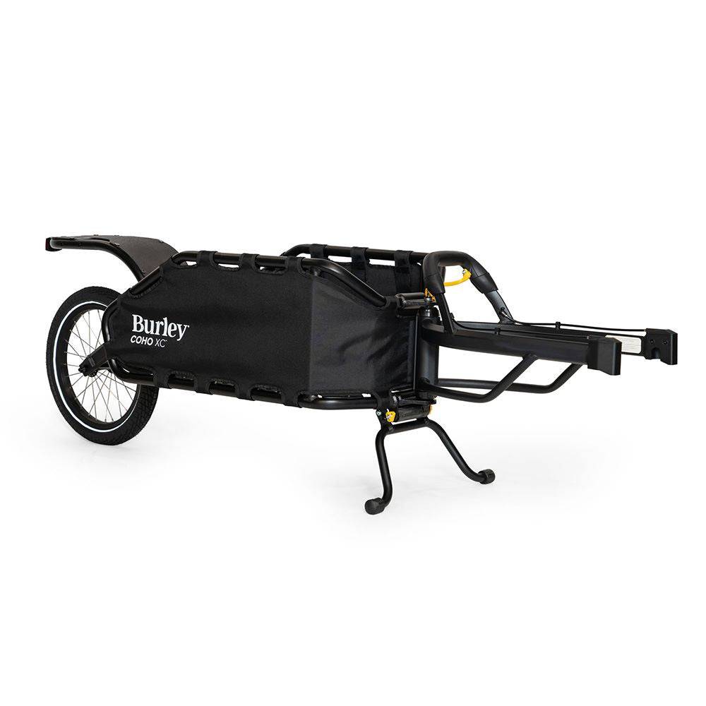 Burley Coho XC cargo bike trailer with suspension and quick release lever, designed for versatile cycling and cargo transport.