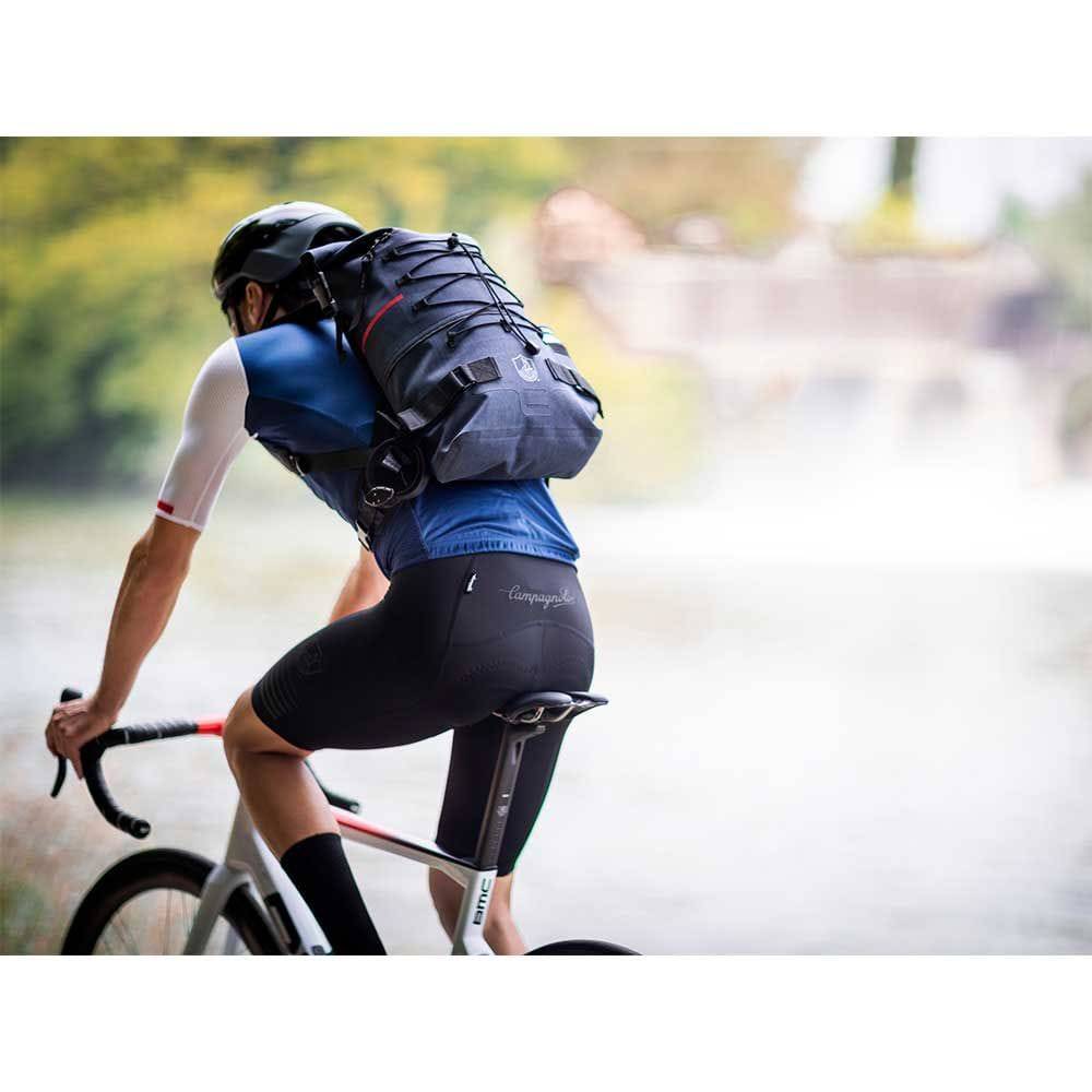 Campagnolo Roll Top Cycling Backpack showing waterproof design and adjustable straps for commuting and outdoor cycling.