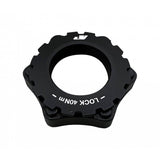 Jagwire 6-bolt to center lock disc rotor adapter for bike brake compatibility, showing the metal adapter with bolt holes.