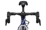 Liv Seek 2 MY26 youth gravel bike with hydraulic disc brakes and adjustable seatpost, featuring a lightweight frame and knobby tires.