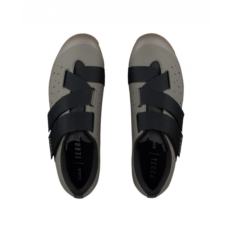 Fizik X4 Terra Powerstrap gravel cycling shoes with adjustable fit and durable outsole, shown in a close-up view.