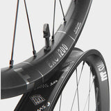 DT Swiss EXC 1200 29" rear mountain bike wheel with 30mm carbon rim and MICRO SPLINE hub for boost compatibility.