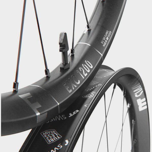 DT Swiss EXC 1200 27.5-inch rear carbon wheel with BOOST Micro Spline XD hub and lightweight rim for mountain biking.
