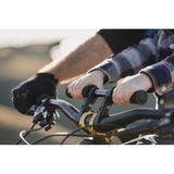 Kids Ride Shotgun 2.0 black child bike seat with handlebars, designed for kids' riding safety and comfort.