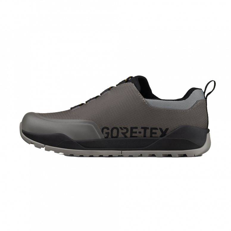 Fizik Terra Ergolace GTX waterproof flat MTB shoes with Vibram outsole, shown in black with textured upper and rugged sole.