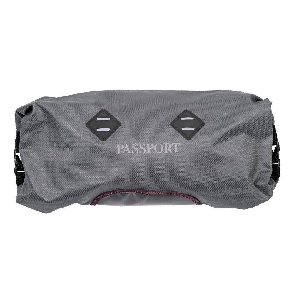 Passport Waterproof Handlebar Pack with LED light mounts, bike accessories designed for secure storage and visibility.