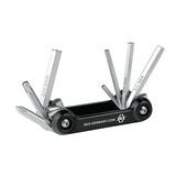SKS TOM 7 bike multi-tool with 7 Allen, Philips, and Torx keys, compact workshop tool for bike repairs and adjustments.