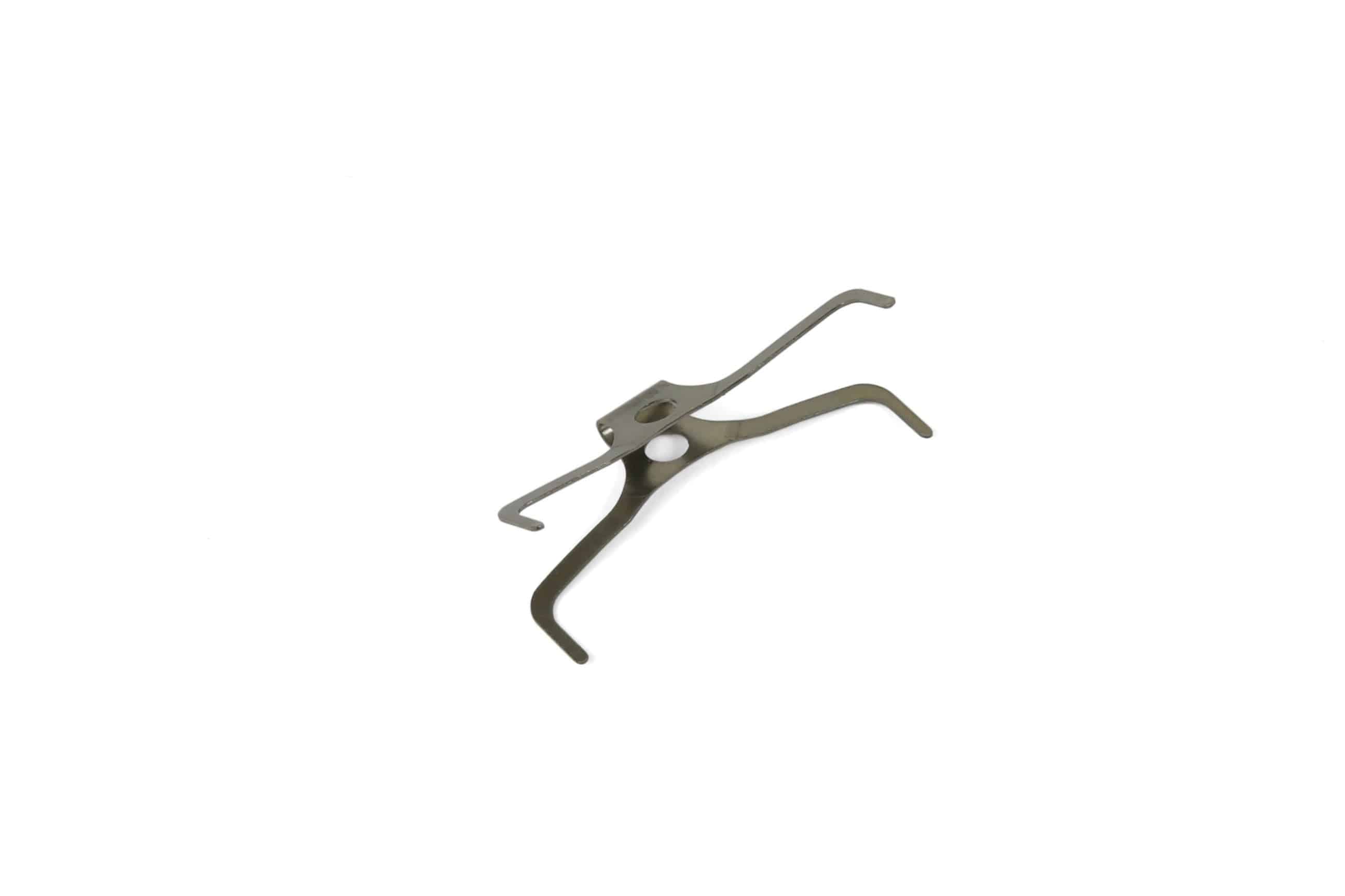 Hope V4 brake pad spring for bicycle components, designed to ensure consistent performance and reduce noise during braking.