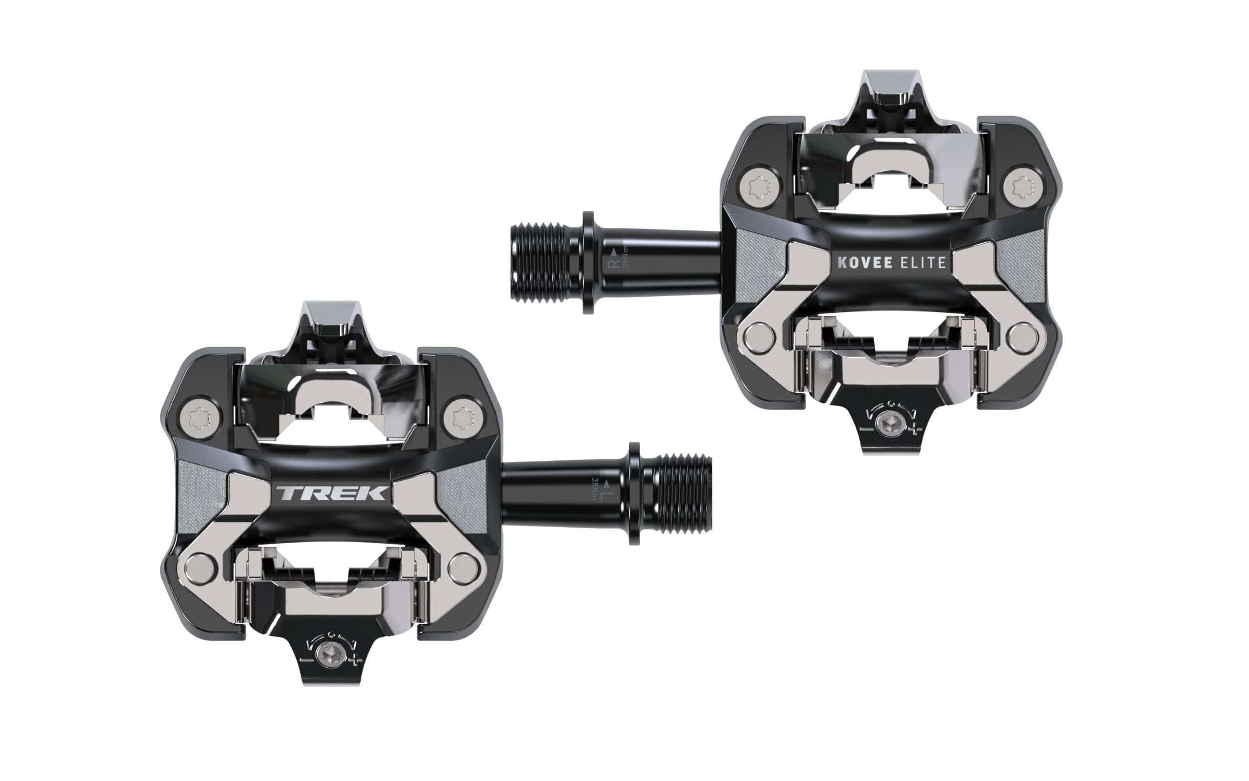 Trek Kovee Elite black clipless pedal set with 9/16" spindle for cycling performance, showing the pedals' design and branding.