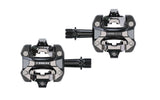 Trek Kovee Elite black clipless pedal set with 9/16" spindle for cycling performance, showing the pedals' design and branding.