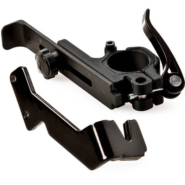 Park Tool TS-25 wheel truing stand mounted on workshop repair stand, used for truing and aligning bicycle wheels.