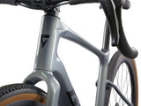 Giant Revolt Advanced 0 gravel bike with adjustable wheelbase and integrated storage, featuring a sleek frame and rugged tires.