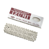 Izumi ES410 NP silver track chain for fixed gear and urban bikes, 1/2" x 1/8" component with links visible.