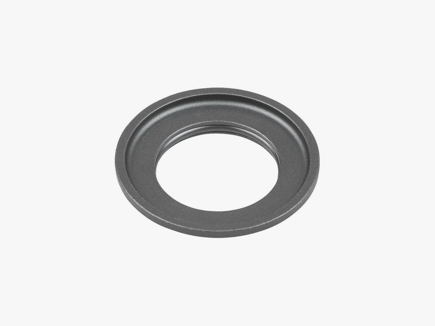 Trek Fuel EXe 2023-2024 black upper headset bearing cover, bike component protection, mounted on bicycle frame.