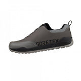 Fizik Terra Ergolace GTX waterproof flat MTB shoes with Vibram outsole, showing the black cycling shoes with rugged tread detail.