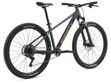 Giant Talon 29 2 mountain bike with suspension, 1x drivetrain, durable frame, and high-volume tires for off-road riding.