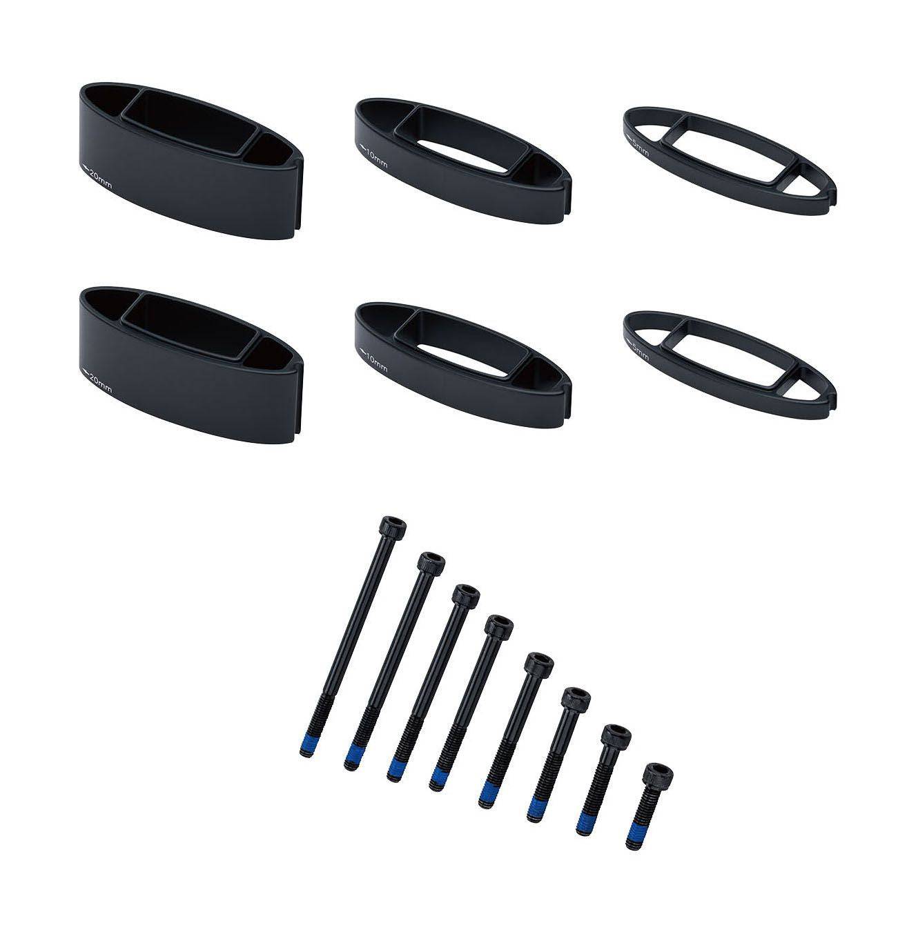 Vision Metron TFA armrest stack spacers and bolts for stable handlebar fit, shown with components on a bicycle handlebar.