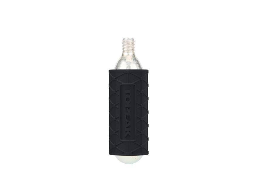 Pair of Topeak silicone CO2 cartridge sleeves for inflator protection, shown in black with a smooth, flexible design.
