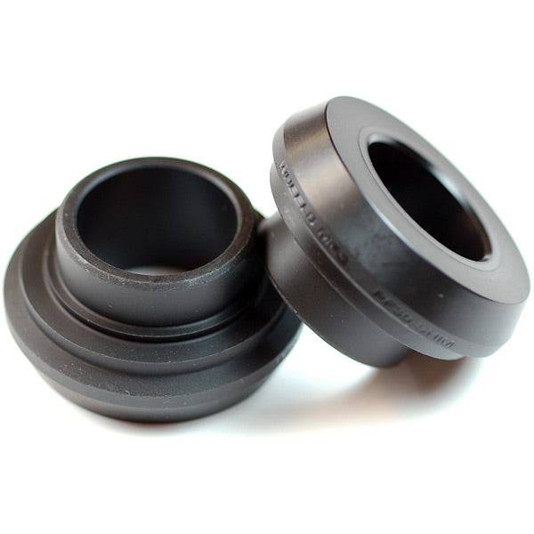 Wheels Manufacturing PF30 to 24mm Shimano HollowTech-II crank spindle shims for bike component compatibility.