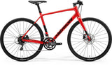 Merida Speeder 200 MY24 hybrid bike with Shimano Sora gears and hydraulic disc brakes, showcasing its sleek frame and riding position.