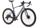 Giant Revolt Advanced Pro 0 gravel bike with customizable wheelbase and integrated storage, shown with sleek frame and mountain bike tires.
