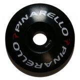 Pinarello round alloy top cap for bicycle headset, replacement component, durable metal bike part, with branding details visible.