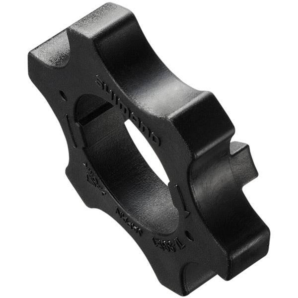 Shimano TL-SGE1 first gear set tool for precise bike gear adjustment and maintenance, shown in a workshop setting.