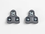 Bontrager grey road clipless pedal cleat set with mounting hardware, designed for bike pedals and cycling performance.