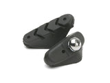 Giant road bike caliper brake pads with mounting hardware, suitable for wet and dry riding conditions.
