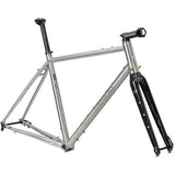 Genesis Croix De Fer Titanium gravel frameset with carbon fork and disc brake mounts, showing sleek frame and fork details.