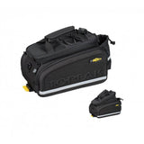 Topeak MTX TrunkBag DX 2.0 black bike rack bag with multiple compartments and reflective safety features.