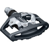 Shimano PD-EH500 dual-sided SPD pedals for commuting and touring, featuring clipless and flat pedal options.