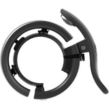 Knog Oi Prima bike bell with Wave-Tek technology and cable management, showing sleek design and mounting mechanism.
