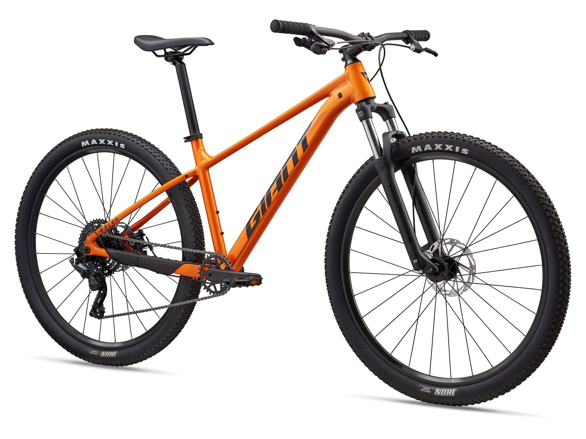 Giant Talon 29 4 mountain bike with front suspension fork and microSHIFT 1x drivetrain, shown on rugged trail.