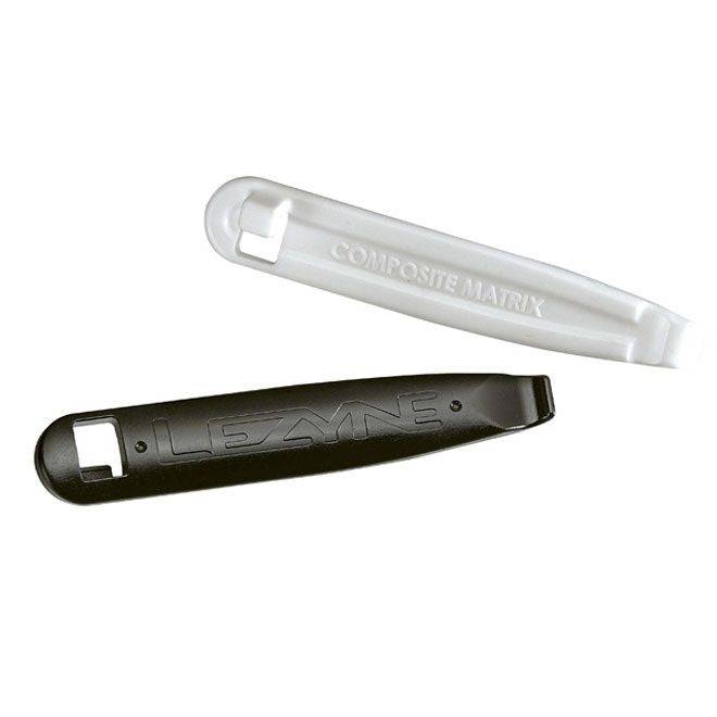 Lezyne Power Tyre Lever Pair made of durable composite matrix for puncture repair, shown in a workshop setting.