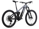Giant Reign Advanced E+ 1 2026 electric mountain bike with SyncDrive Pro 3 motor and Maestro suspension, shown outdoors on trail