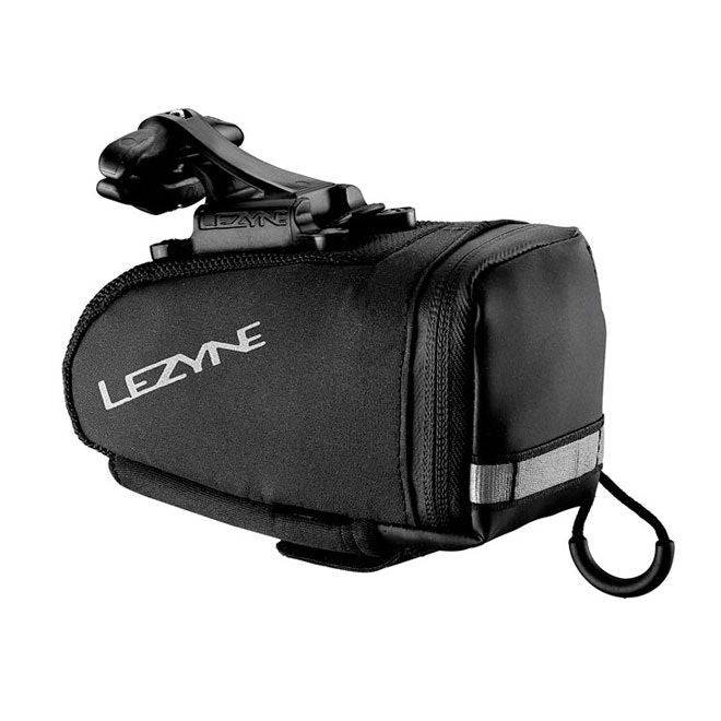 Lezyne M Caddy QR Medium saddle bag in black with quick-release mount attached to a bicycle saddle.
