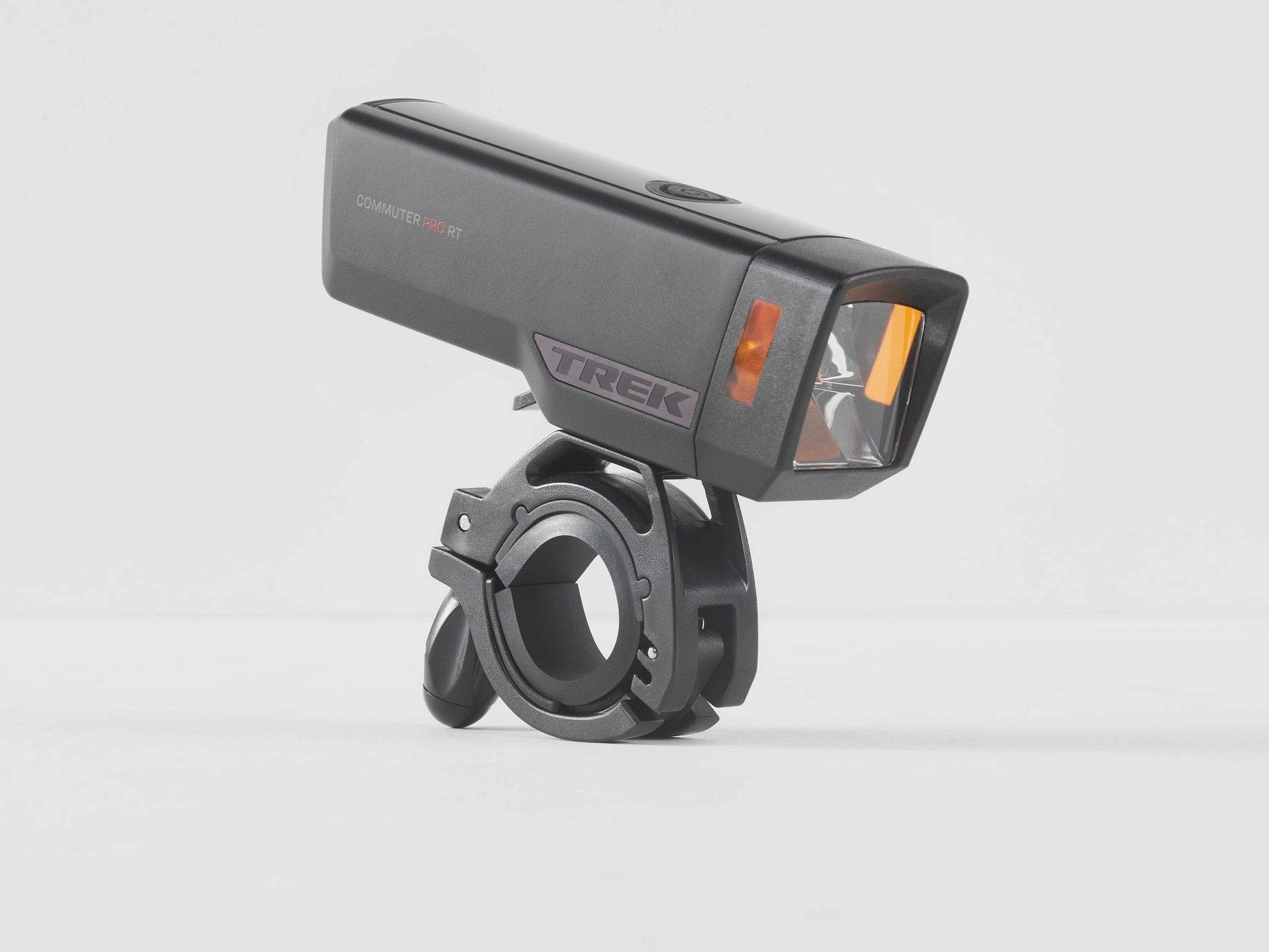 Trek Commuter Pro RT front bike light in black with 1000 lumens, USB-C rechargeable, mounted on a bicycle handlebar.