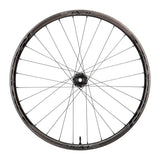 Race Face Next R 36mm carbon MTB wheels with tubeless-ready design and boost axle, shown from a side angle.