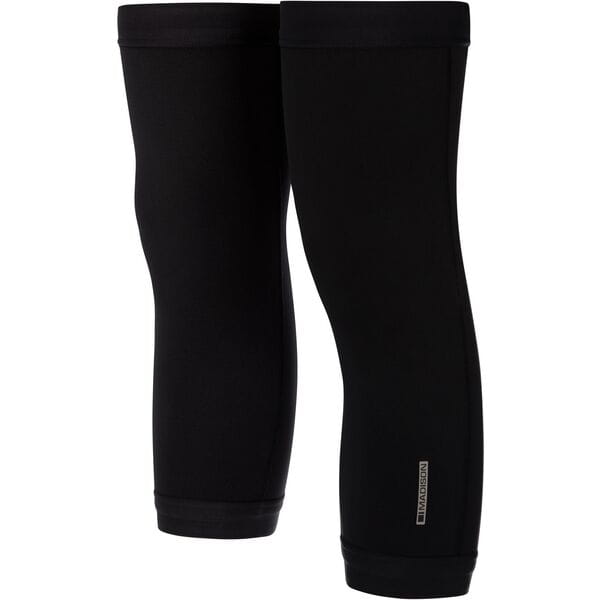 Madison DTE Isoler thermal knee warmers with water-repellent coating, designed for outdoor winter activities, in black fabric.