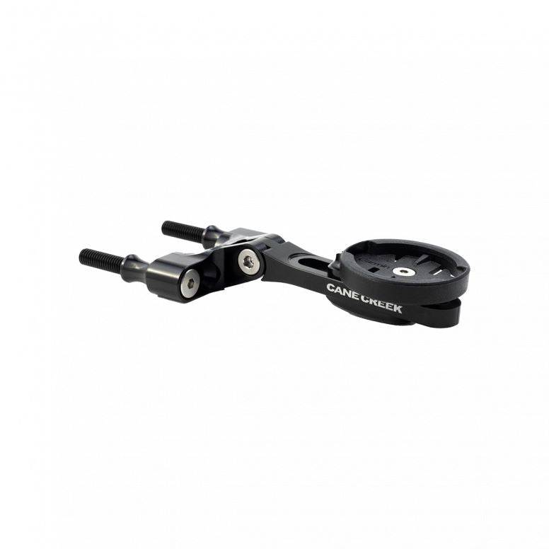 Cane Creek black computer mount for Garmin and Wahoo cycling devices, attached to a bike handlebar.