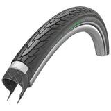 Schwalbe Road Cruiser Plus bicycle tyre showing tread pattern and sidewall with branding, designed for durable puncture protection.