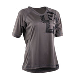 Race Face Nimby women's lightweight breathable MTB cycling jersey shown, crafted for comfort and performance during mountain biking.